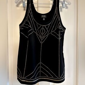 Women’s dress tank in black with studded gold detail.